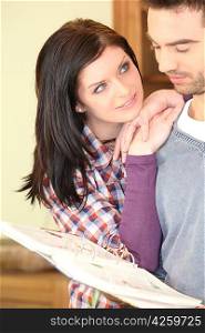 Young woman looking at her boyfriend tenderly