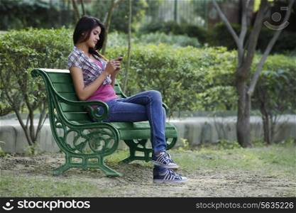 Young Woman looking at her mobile