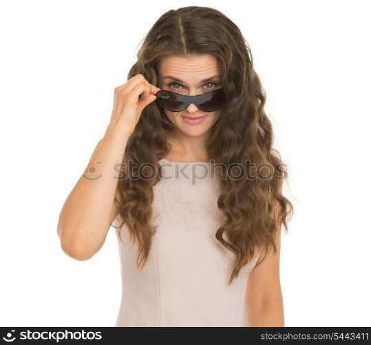 Young woman looking from sunglasses