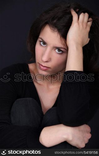 young woman looking sad