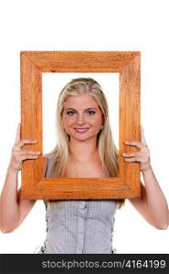 young woman looking through a picture frame.