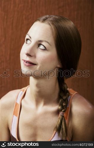 Young woman looking up
