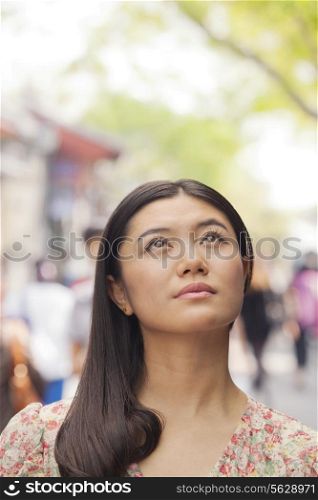 Young Woman looking up
