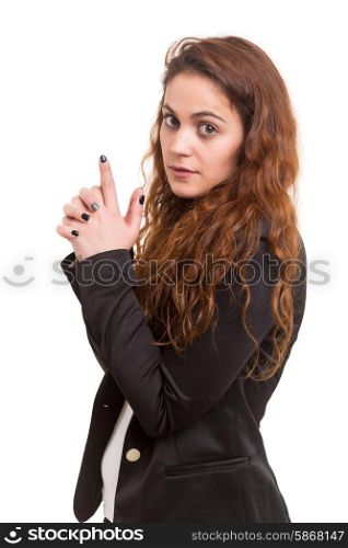 Young woman making a gun with her hands - business concept