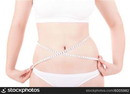 Young woman measuring her body - diet concept