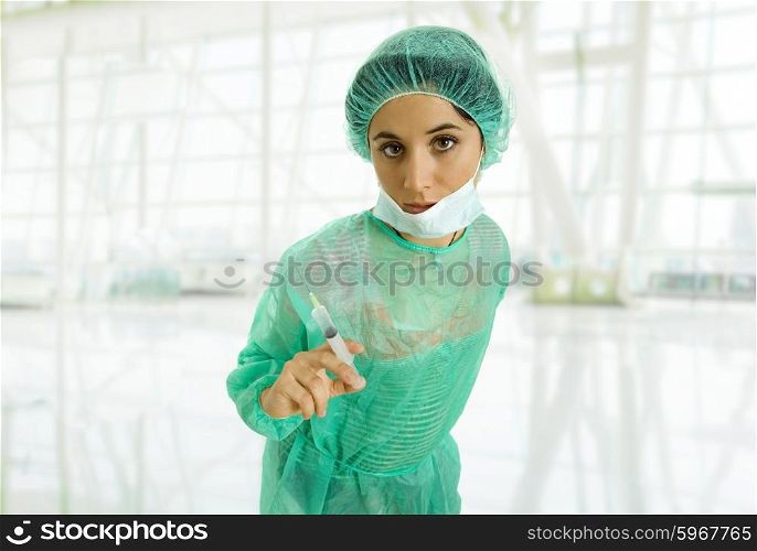 young woman nurse portrait with a syringe
