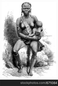 Young woman of the tribe of Pahouins, vintage engraved illustration. Le Tour du Monde, Travel Journal, (1865).