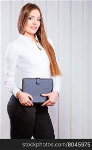 Young woman office worker hold case with files.. Career business work in office. Young woman in formal wear hold case with files documents paperwork.