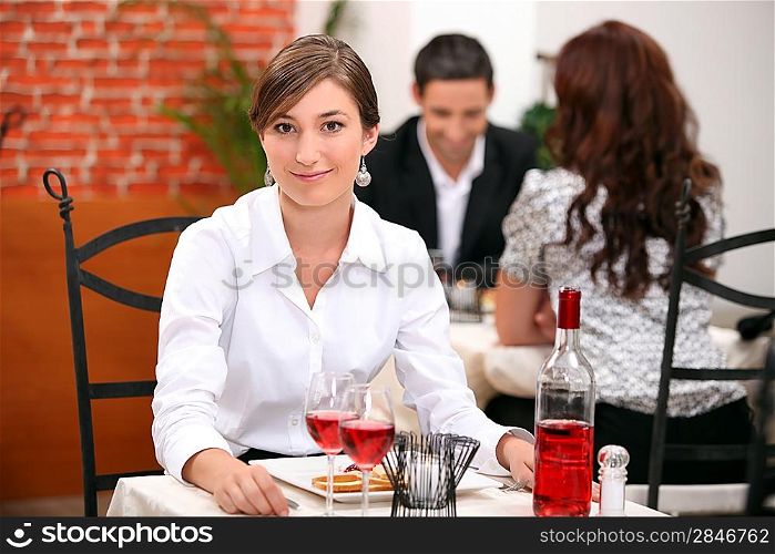 Young woman on a date in a restaurant