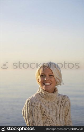 Young woman on beach, portrait