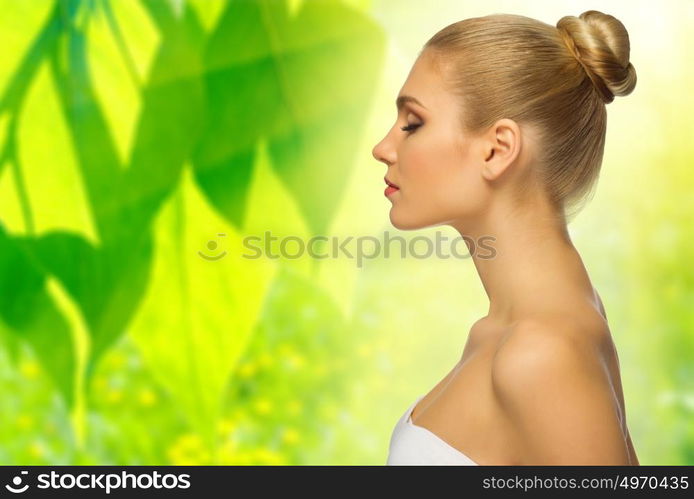 Young woman on floral background