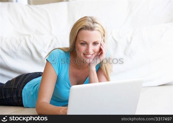 Young woman on her laptop computer