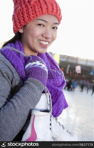 Young woman on ice rink
