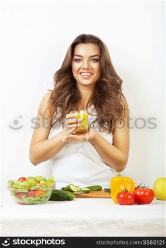 young woman on kitchen with juice