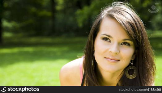 Young Woman On Natural Background