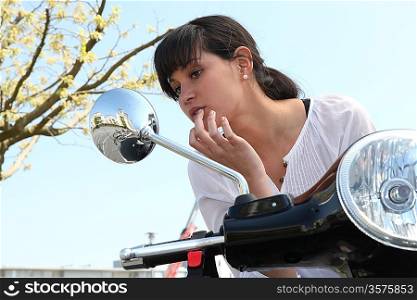 young woman on scooter