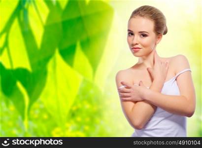 Young woman on spring floral background