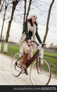 Young woman on the bicycle