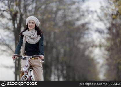 Young woman on the bicycle
