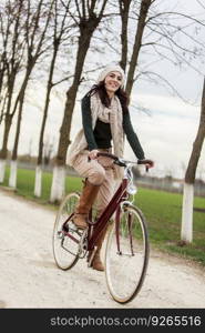 Young woman on the bicycle