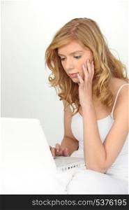 Young woman on the computer