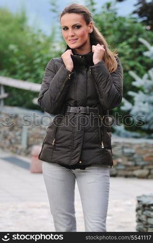 young woman outdoor with fasnionable clothing