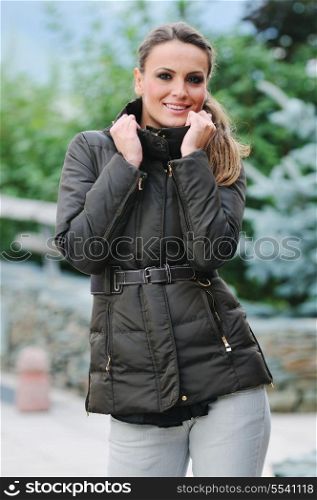 young woman outdoor with fasnionable clothing