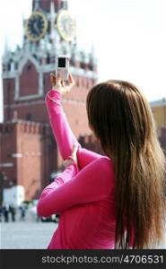 Young woman photographed attractions in Moscow