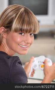Young woman playing a video game