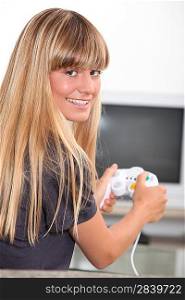 Young woman playing computer game