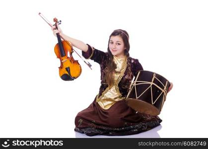 Young woman playing musical instruments on white