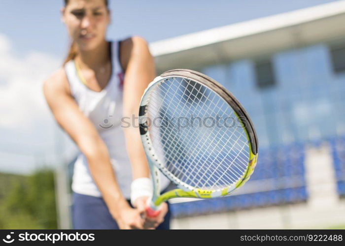 Young woman playing tennis