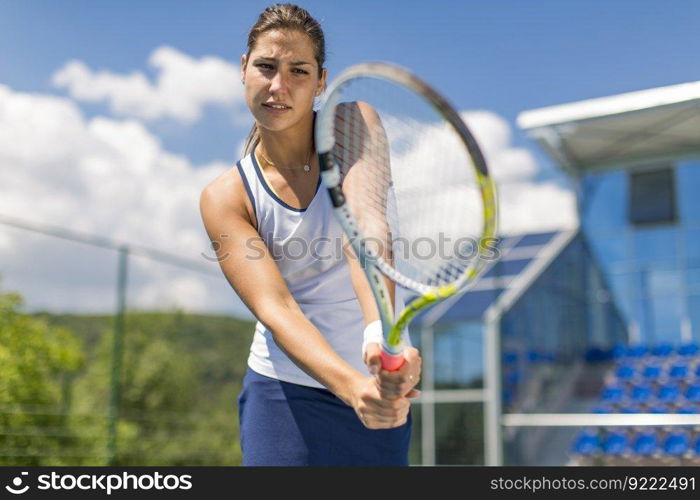 Young woman playing tennis