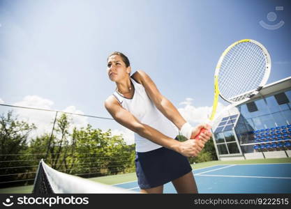 Young woman playing tennis