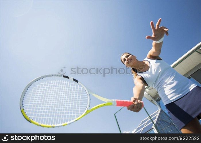 Young woman playing tennis