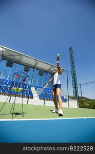 Young woman playing tennis