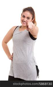 Young woman pointing her finger at you calling to exercise