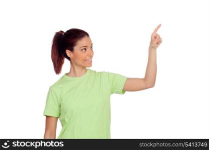 Young woman pointing with the finger isolated on a white background