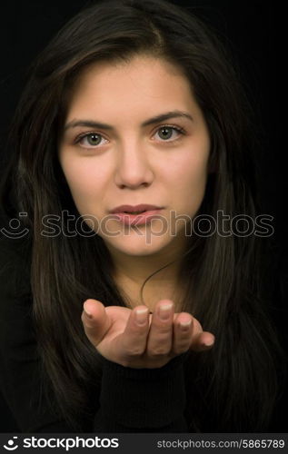 young woman portrait isolated on black background