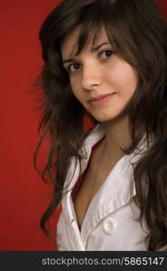 young woman portrait isolated on red background