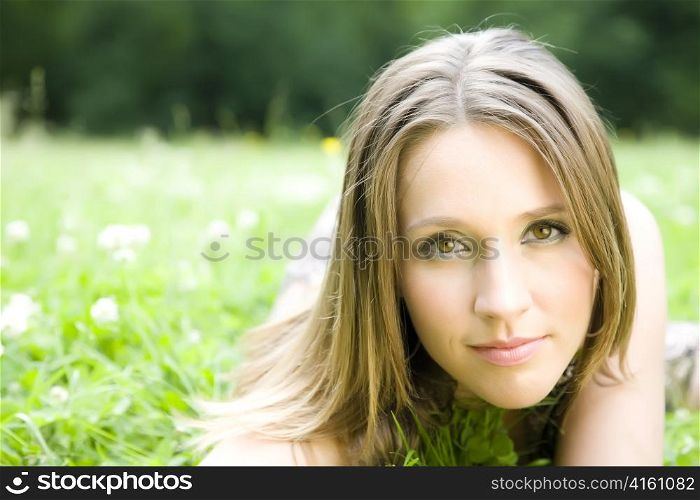 Young Woman Portrait On The Meadow