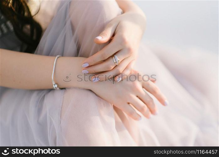 Young woman posing in a white wedding dress. Young woman posing in a white wedding dress close up