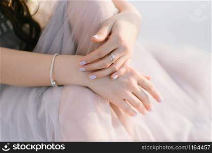 Young woman posing in a white wedding dress. Young woman posing in a white wedding dress close up