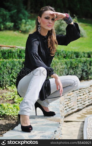 young woman posing in fashion business and caual clothing outdoor