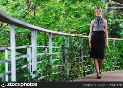 young woman posing in fashion business and caual clothing outdoor