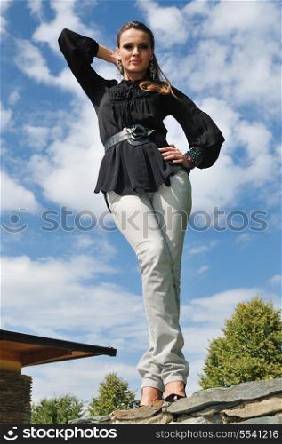 young woman posing in fashion business and caual clothing outdoor
