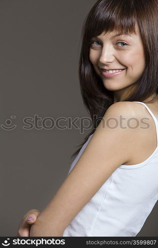 Young woman posing in tank top