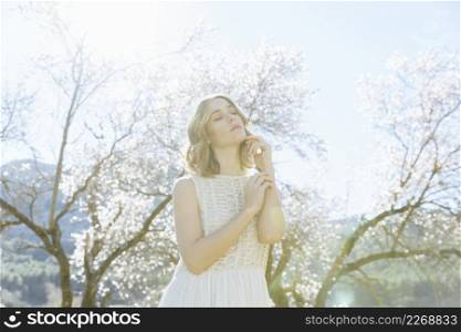 young woman posing sunlight