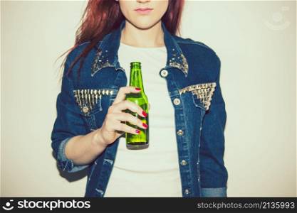 young woman posing with beer