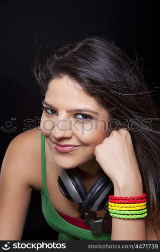 Young woman posing with headphones